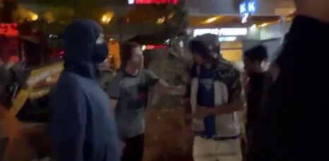 Still No. 2 from sidewalk video of confrontation (web)